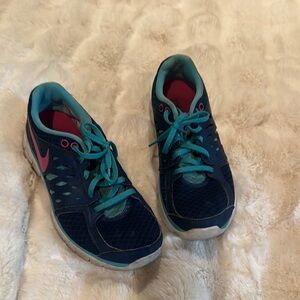 Nike Blue and Pink Athletic Shoes for Performance